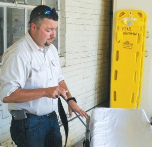 Matt Leicester, First Med Director of Operations for Bertie County, performs an inspection at the Aulander location. Staff Photo by Gene Motley