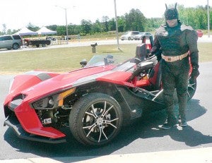 Vernard Jones of Waverly, VA played the role of “Batman” – complete with a unique vehicle (a Slingshot – a tri-wheeled motorcycle) – at the 2016 Northampton County Relay for Life. | Photo by Kim Bunch Hoggard