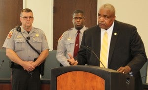 At a press conference held Friday at the courthouse, Hertford County Sheriff Juan Vaughan (at podium) goes over the details of a murder arrest in the death of DaMarco Duncan. In the background are Hertford County Sheriff Deputies John Parker (left) and Jesse Fennell. Staff Photo by Cal Bryant