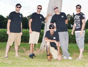 Southern Rock band 7100 members are, from left, Timmy Davis, Brandon Wheeler, Kevin Cribb (crouched), Chris Johnson, and Shelton Walton. They will perform at the Jefcoat Museum auditorium on Saturday, Aug. 27. 
