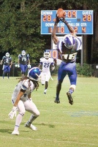 With the game tied at 28-28 early in the fourth quarter, senior receiver Tyrone Carter made this critical leaping grab of a 43-yard pass from Randall Dixon that eventually set up Chowan’s game-winning touchdown. | Staff Photo by Cal Bryant