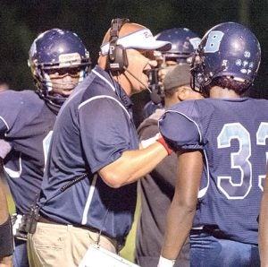 Bertie head coach Grantley Mizelle tries to encourage his team during their Monday night loss vs. Northeastern. Mizelle and the Falcons will step outside conference action this Friday when they play host to Williamston Riverside at Roy F. Bond Stadium. | Photo by Angie Todd